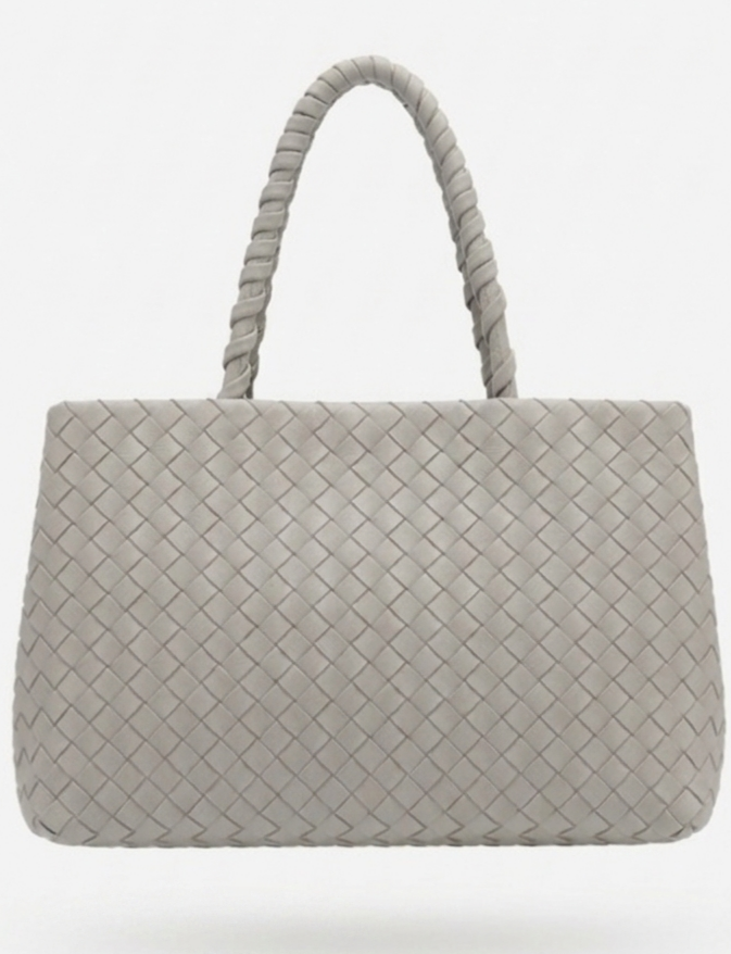 Borsa a mano intrecciata in camoscio ecopelle