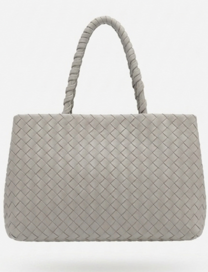 Borsa a mano intrecciata in camoscio ecopelle