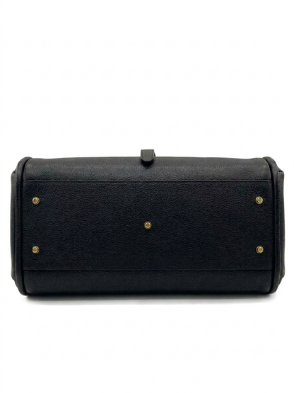 Borsa in vera pelle martellata con interno a contrasto