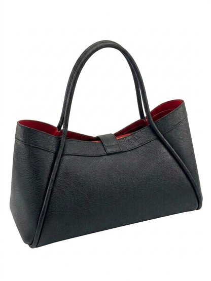 Borsa in vera pelle martellata con interno a contrasto